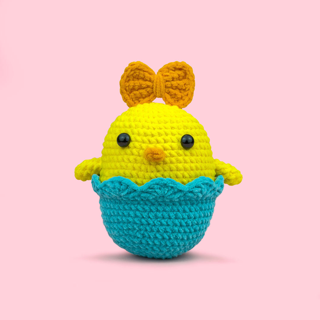 The Cute Crochet beginner kit - yellow chick with orange bow in blue egg shell